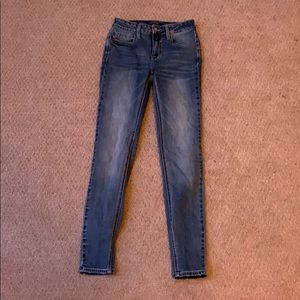 Mid rise distressed jeans